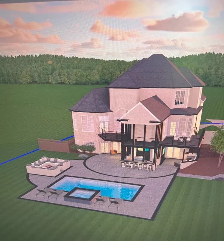 Luxury home exterior with pool, patio, and landscaped yard at sunset.