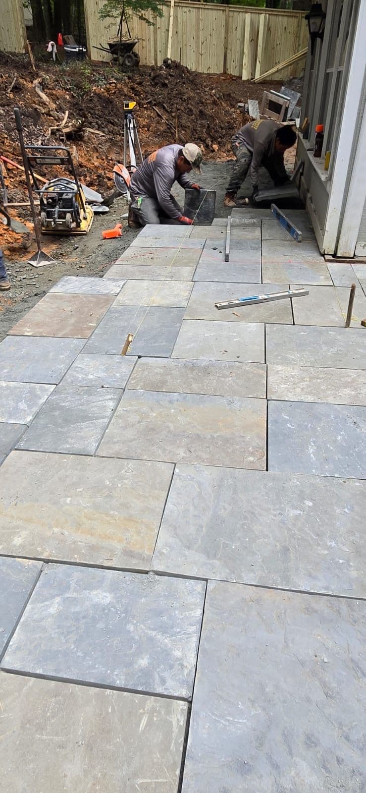 Transformative Ashlar Patio and Retaining Wall